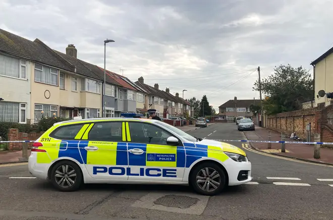 Police at the scene in Auriel Avenue, Dagenham where one woman died and another was injured in a double stabbing