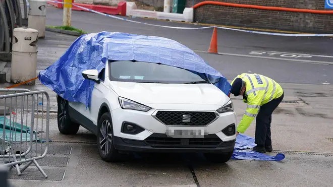 Police examined a white Seat