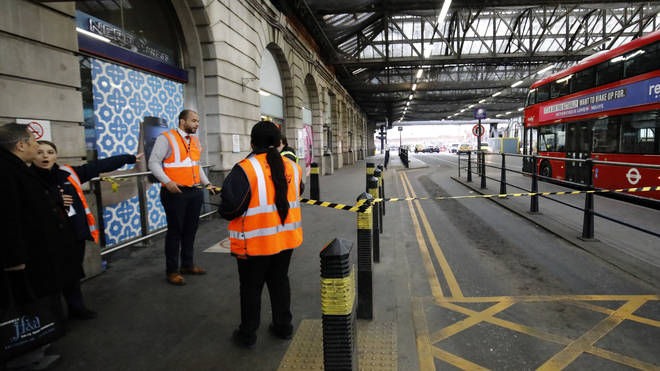 A police cordon at Waterloo Station after a small explosive device was discovered, as well as packages near London Heathrow and City airports