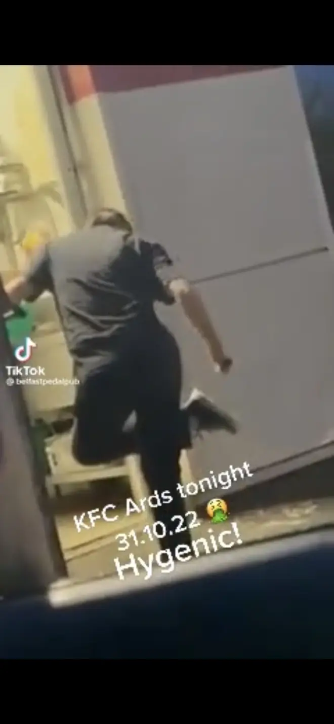 TikTok video appears to show KFC worker scraping shoe with cooking utensil