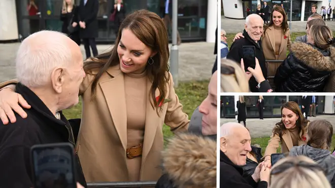 Kate took pictures with members of the public on Thursday, including a man who put his arm around her