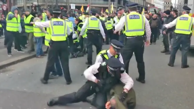 Met Police Medic seen seeming to punch a protester
