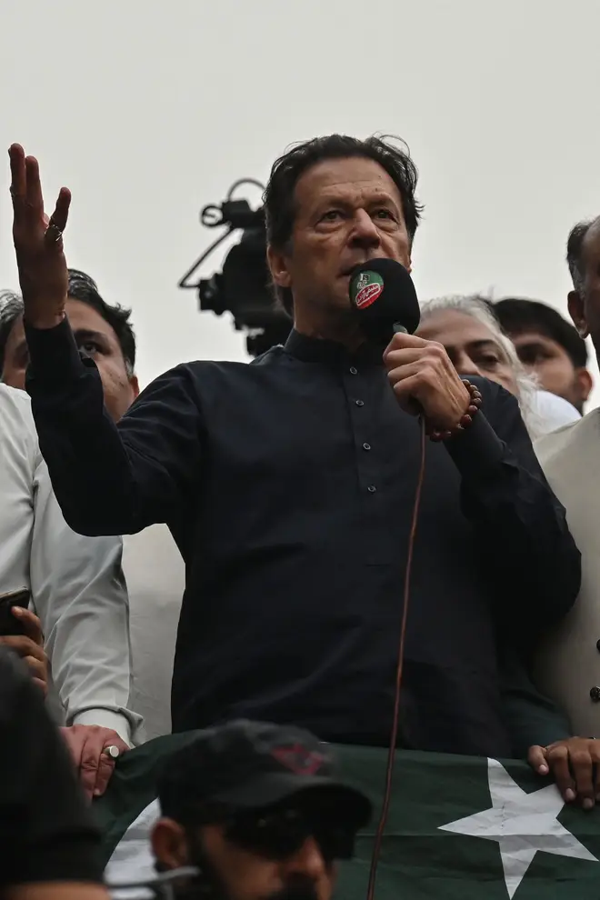 Mr Khan addresses his supporters during an anti-government march on November 1
