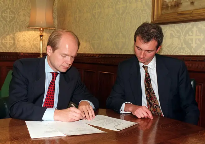 David Lidington sits with Conservative leader William Hague in 1997