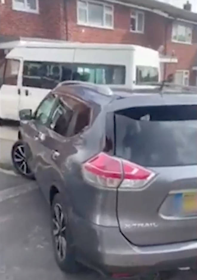 Moment bailiff finds her own car clamped after blocking disabled man's driveway