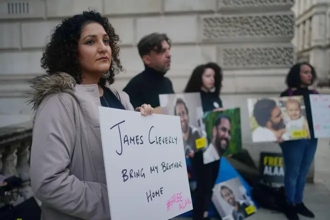 Mona Seif protesting for her brother at a sit-in outside the Foreign Office in London in October.