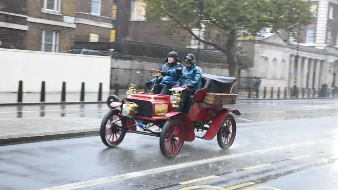 Many of the Kent vehicles are open top and the passengers are having to don wet weather gear.