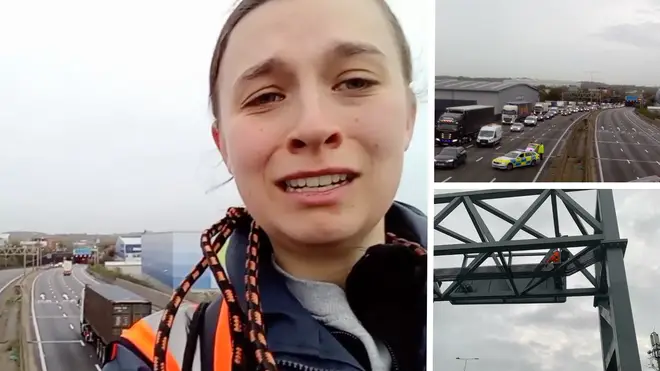 An eco protester has issued an emotional plea from the top of an M25 gantry