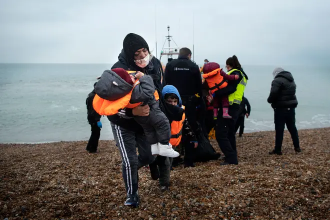 Migrants arriving on the beach in Dungeness