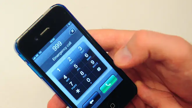 A 999 call being made on a mobile phone