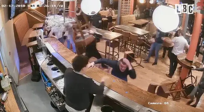 Bar stools and glasses were thrown in the shocking incident
