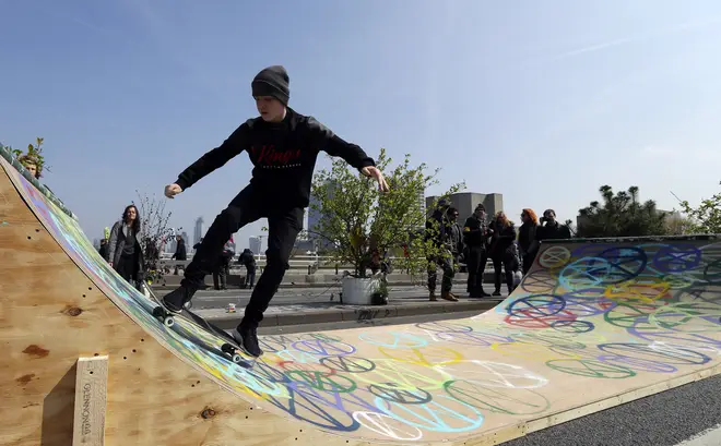 Climate change protesters turned Waterloo Bridge into a skate park on Monday