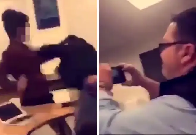 The teacher has been suspended after recording the fight on his phone