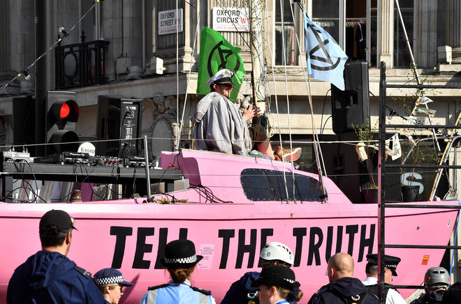 Police officers removed a pink boat from Oxford Circus during Extinction Rebellion protests