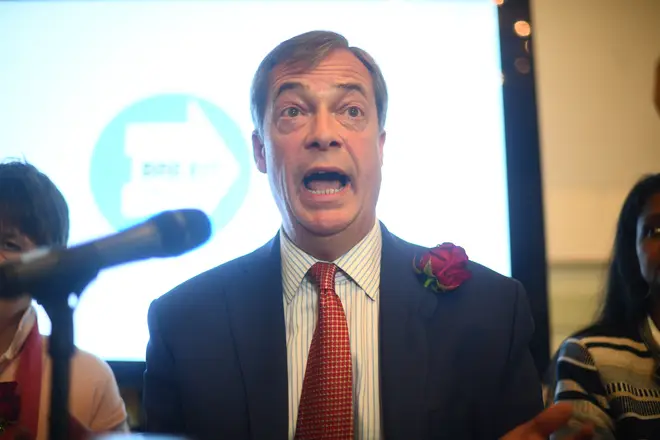 Nigel Farage addresses the crowd at a Brexit Party event.