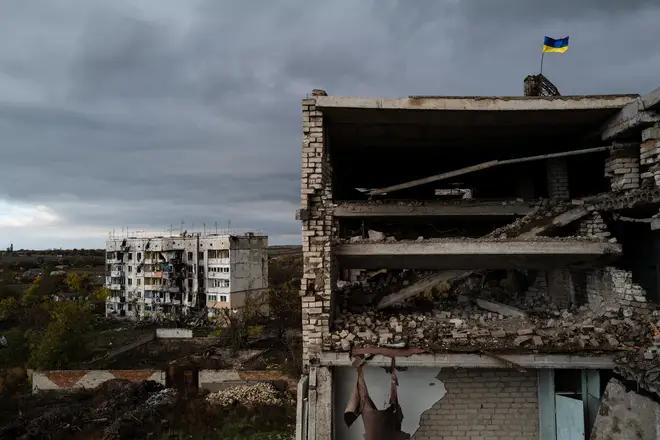 The recently recaptured village of Archangelske in Kherson Oblast, with a Ukrainian flag flying on a rooftop