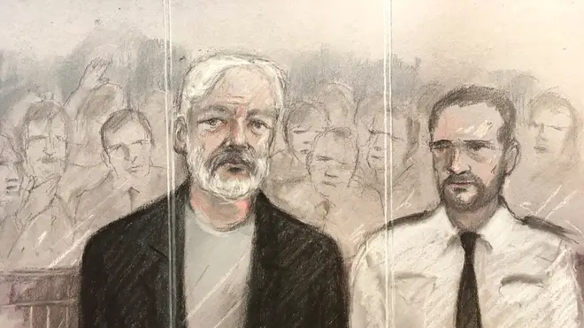 Julian Assange appears in court. 