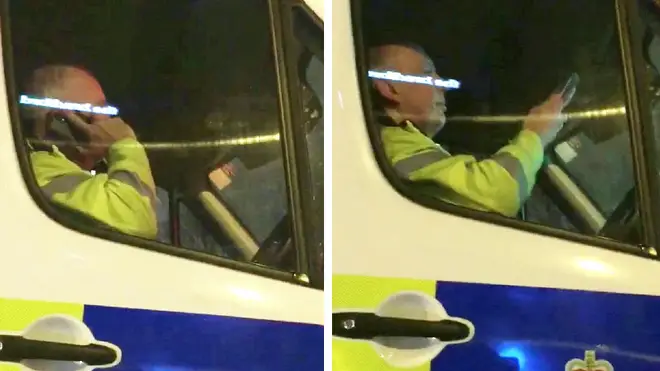 Video appears to show the police officer making a call while behind the wheel