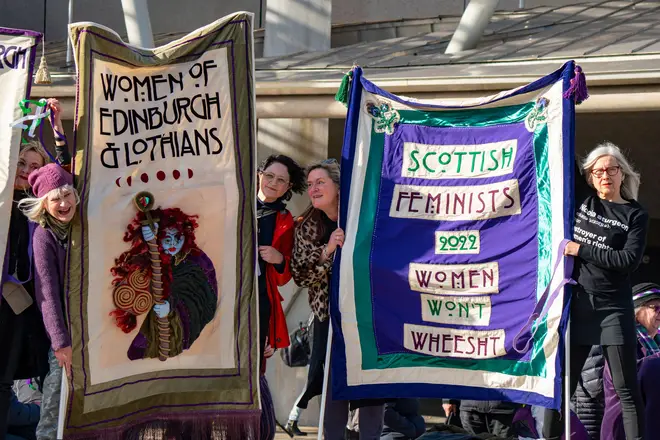 A women's rally outside Holyrood, where wearing the sufragette colours had some women ejected.