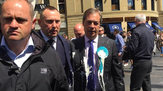 Brexit Party leader Nigel Farage after having a milkshake thrown at him