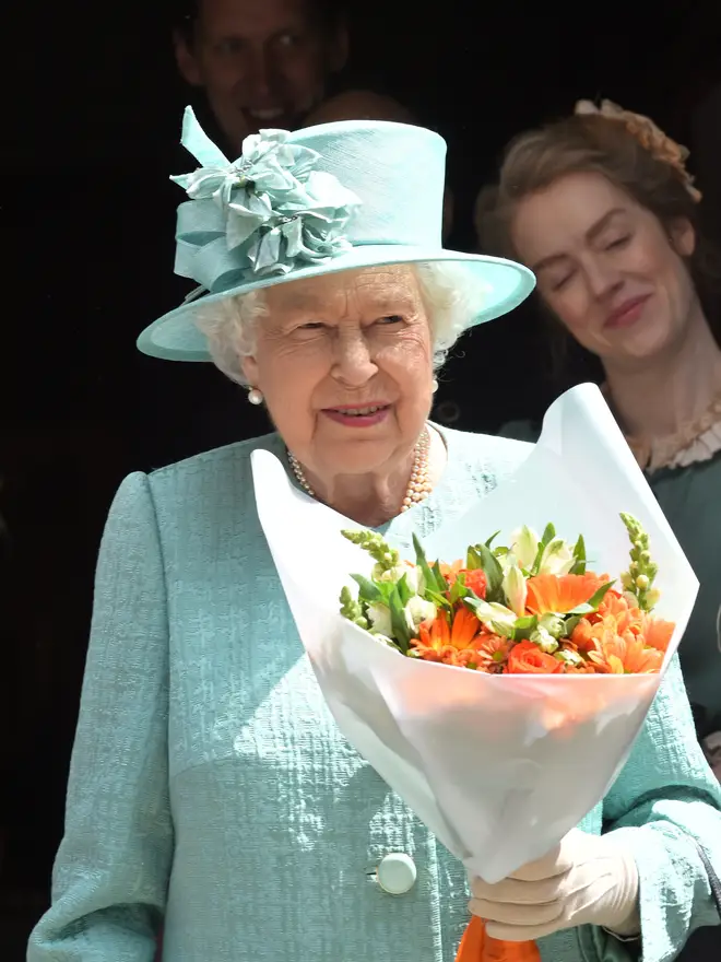 The Queen was presented with a bouquet of flowers.