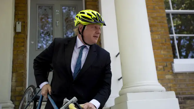 Boris Johnson leaving his home on his bike