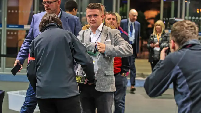 Tommy Robinson goes through security at the count