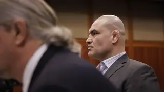 Cain Velasquez, right, appears for his arraignment