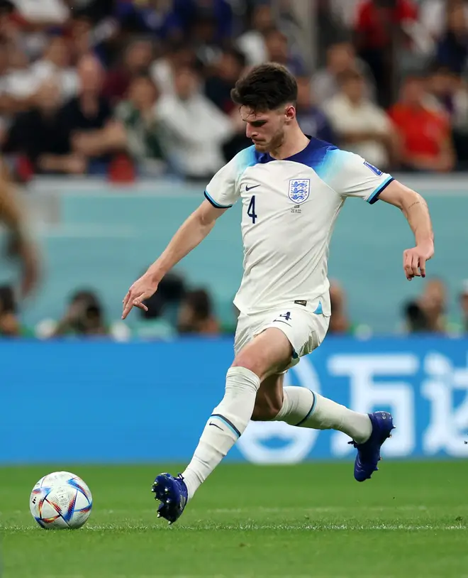 Declan Rice of England runs with the ball
