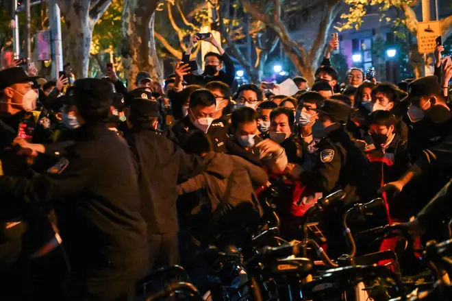 Police clash with protestors in Shanghai this morning