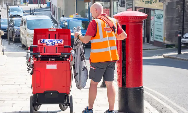 Postman delivering and collecting letters