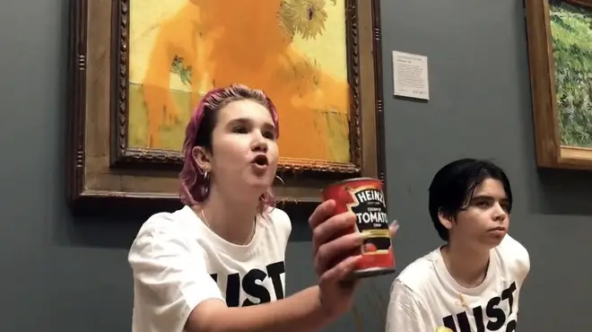Activists after hurling tomato soup over Van Gogh's sunflowers
