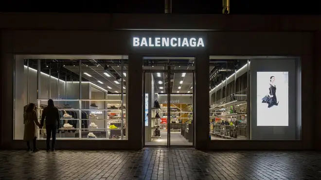 Balenciaga store in Copenhagen, Denmark. October 2022. External view of the Balenciaga brand store by night in the city center