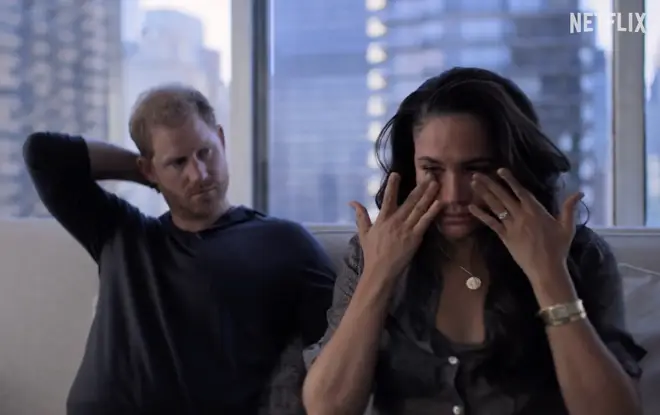Meghan is seen crying on the camera as she becomes overcome with emotion in the short clip.