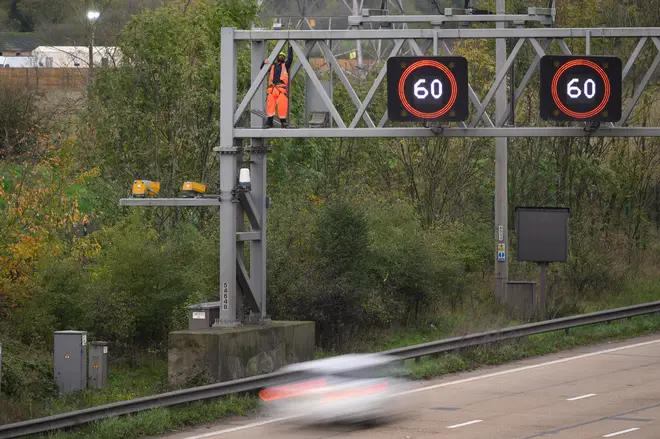 A protester on the M25