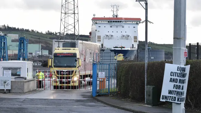 A lorry passes through border checks at a port in Northern Ireland