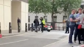 The shocking moment a security guard kicks a homeless person in Westminster