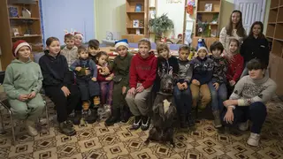 Ukrainian children with therapy dog Bice
