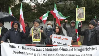 People protest in front of the Iranian embassy in Berlin against the execution of Mohsen Shekari