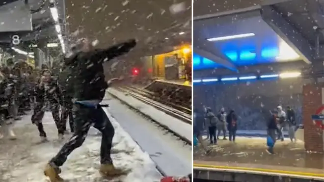 Commuters enjoy snowball fight at West Ham station