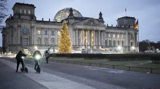 The Reichstag building with the German Parliament Bundestag is illuminated in Berlin, Germany