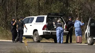 Police work near the scene of a fatal shooting in Wieambilla, Australia
