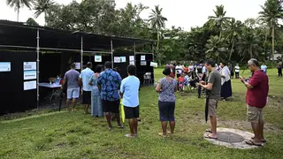 People line up to cast their votes in the Fiji general election in Suva