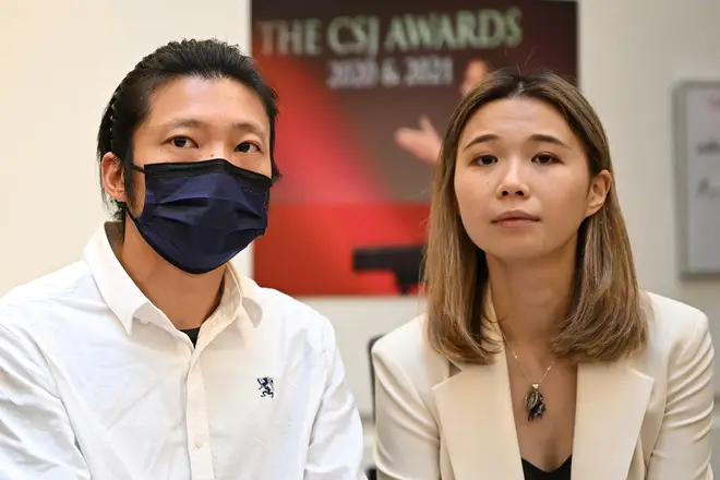ob Chan (L) attends a press conference alongside political activist Chung Ching Kwong (R)
