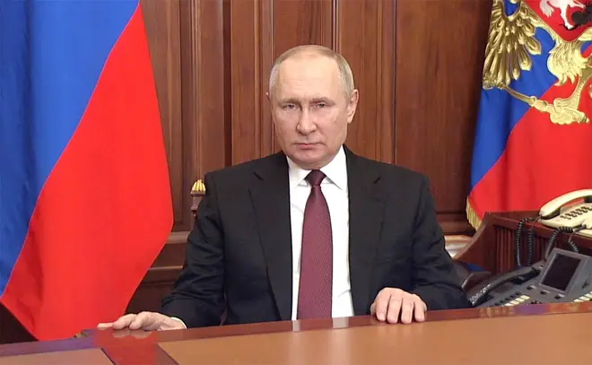 Russian President Vladimir Putin delivers an address to the Russian people announcing the invasion of Ukraine from the Kremlin, February 24, 2022 in Moscow, Russia.