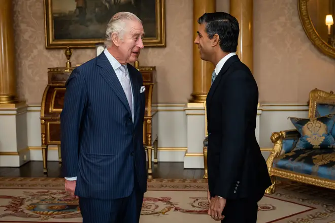 King Charles III welcomes Rishi Sunak during an audience at Buckingham Palace, where he invited the newly elected leader of the Conservative Party to become Prime Minister and form a new government.