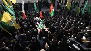 Mourners carry the body of Ahmed Daraghmeh