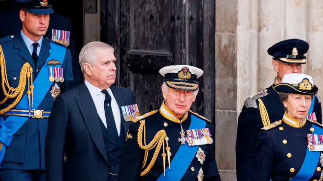 King Charles and Prince Andrew are pictured at their mother's funeral