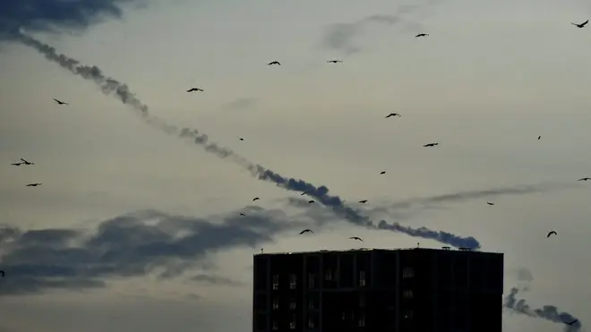 Missiles contrails are seen in the sky over Kyiv