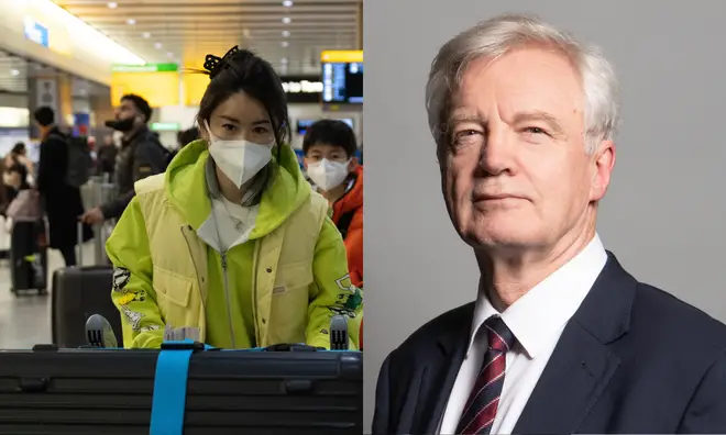 Photograph of travellers at the airport in China (left) with David Davis (right)